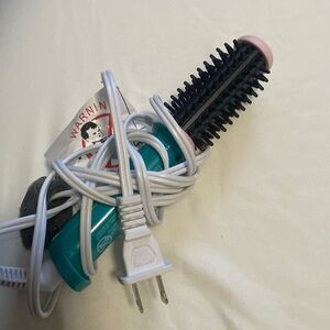 Calista corded mini travel brush